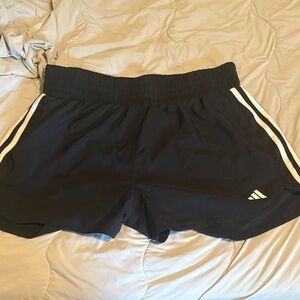 Adidas Women's Navy Blue Athletic Shorts with White Stripes